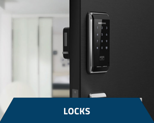 Modern smart keyless door lock installed on a grey door.
